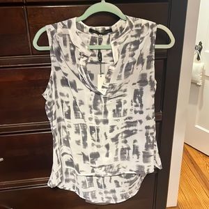 Beautiful sleeveless blouse. Grey and white pattern size M